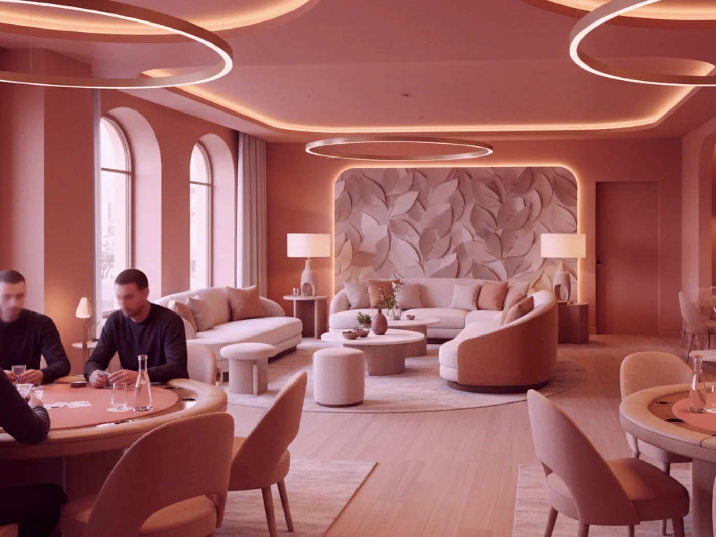 A quieter corner lounge behind the card parlour, two armchairs either side of a low table.
